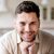 close-up-smiley-man-posing-scaled.jpg