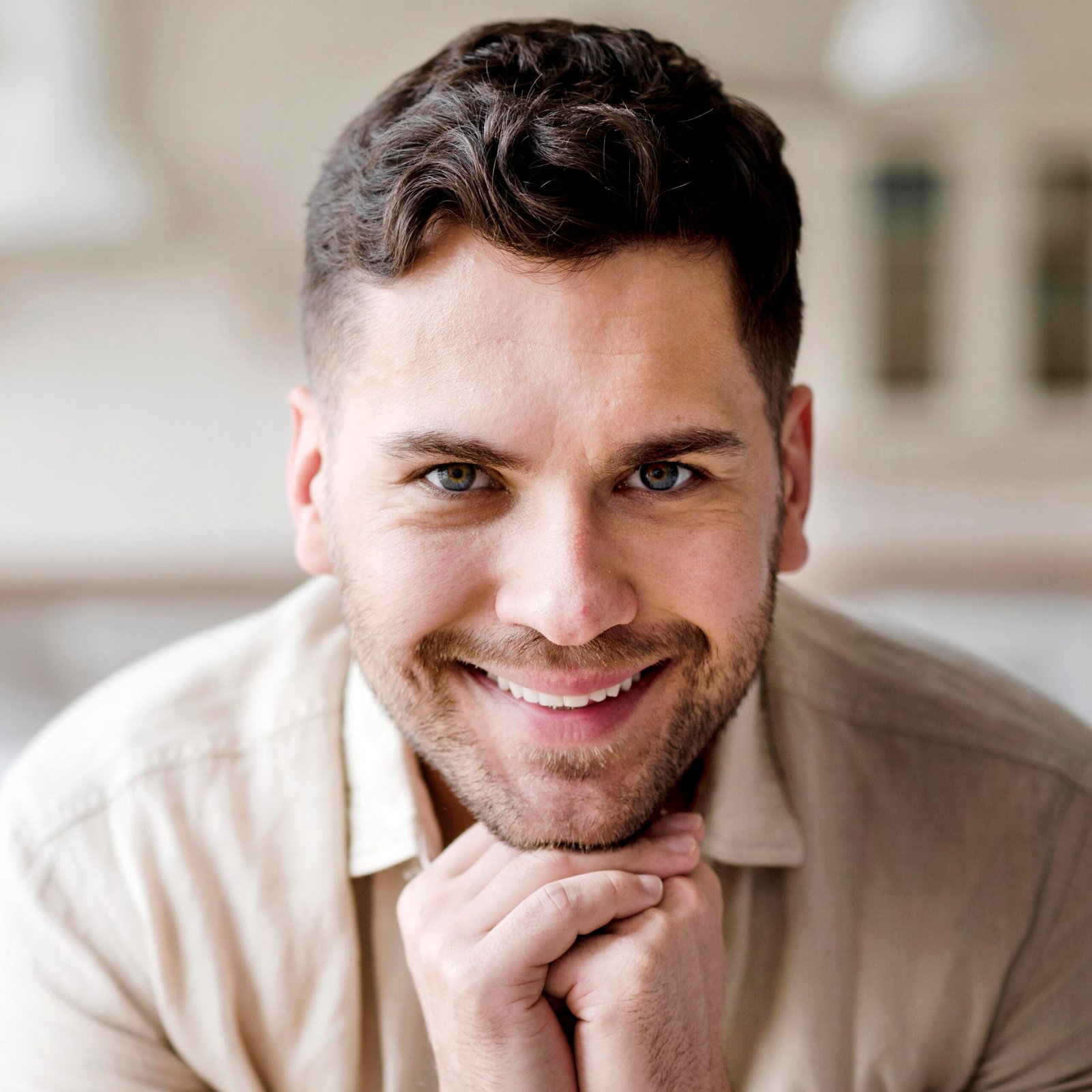 close-up-smiley-man-posing-scaled.jpg